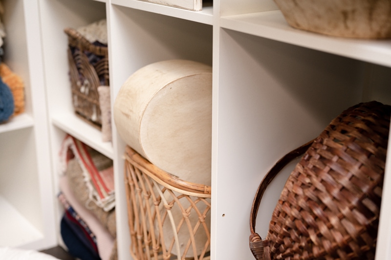 Wooden props and baskets in the studio for newborn sessions.