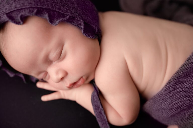 Newborn girl in purple. Pittsburgh newborn photographer